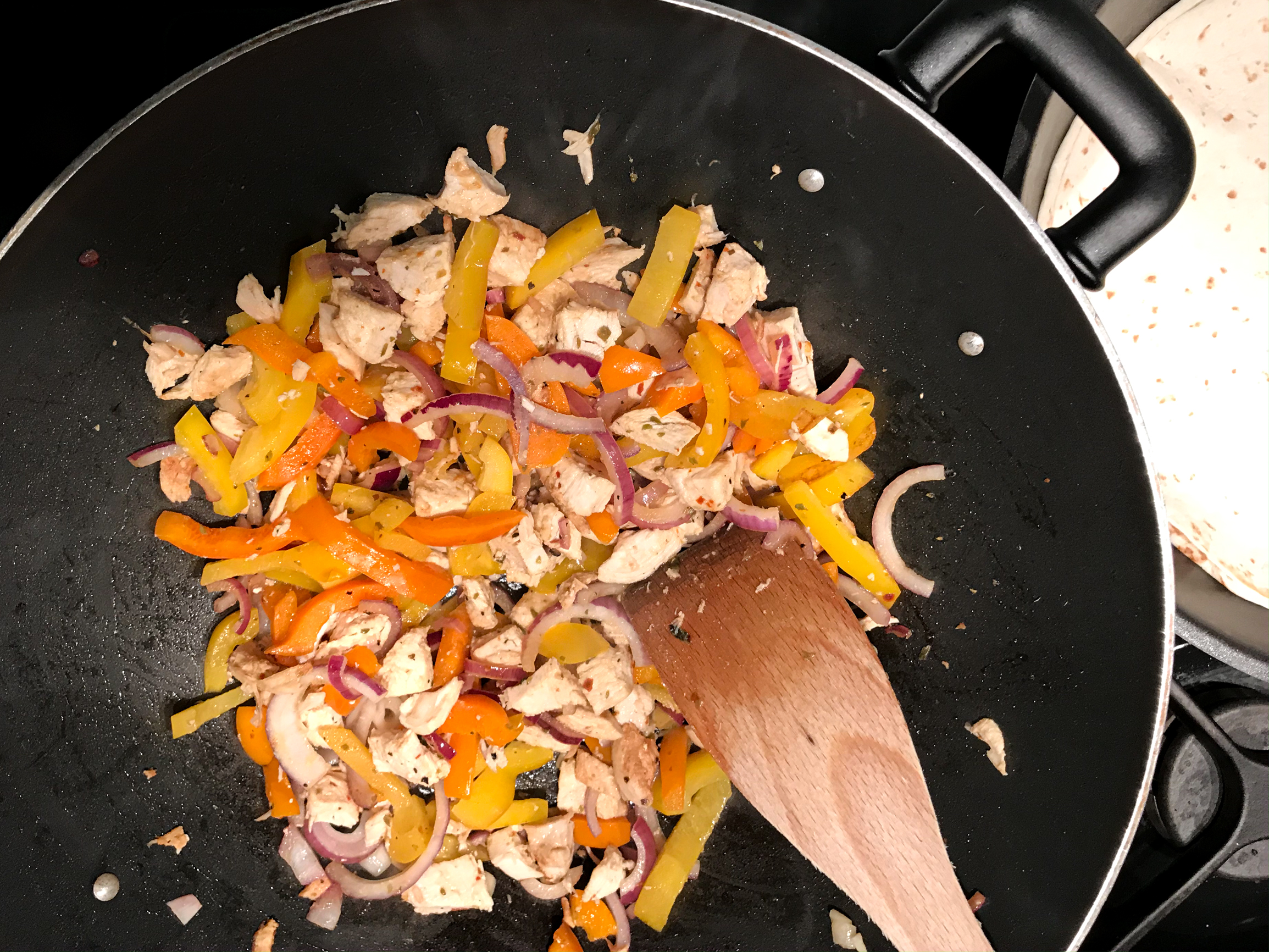 Fajitas van Ainsley met gegrilde kip en paprika